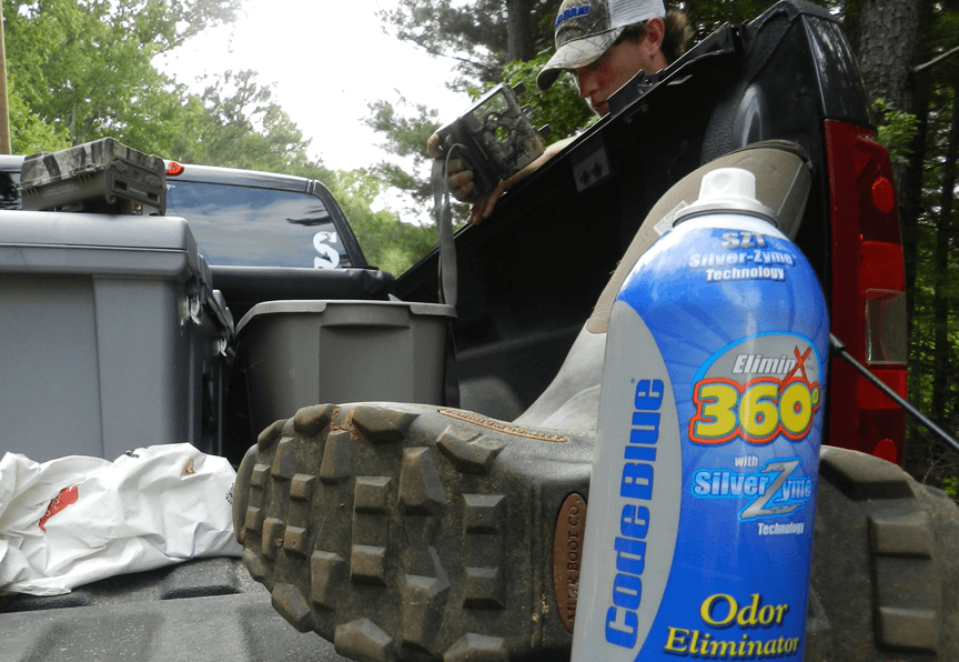 Code Blue Odor Elimination Sitting in Back of Truck with Hunting Gear