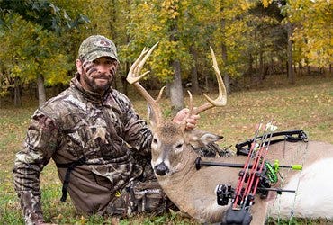 Man with Trophy Whitetail Buck 