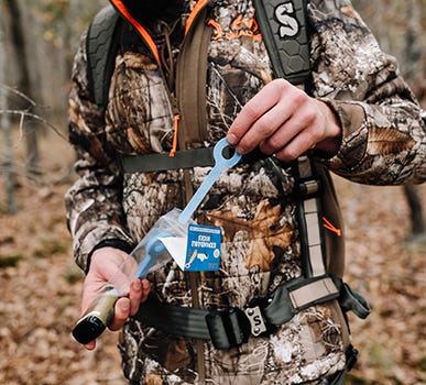 Hunter pulling out Expandable Wick from pack